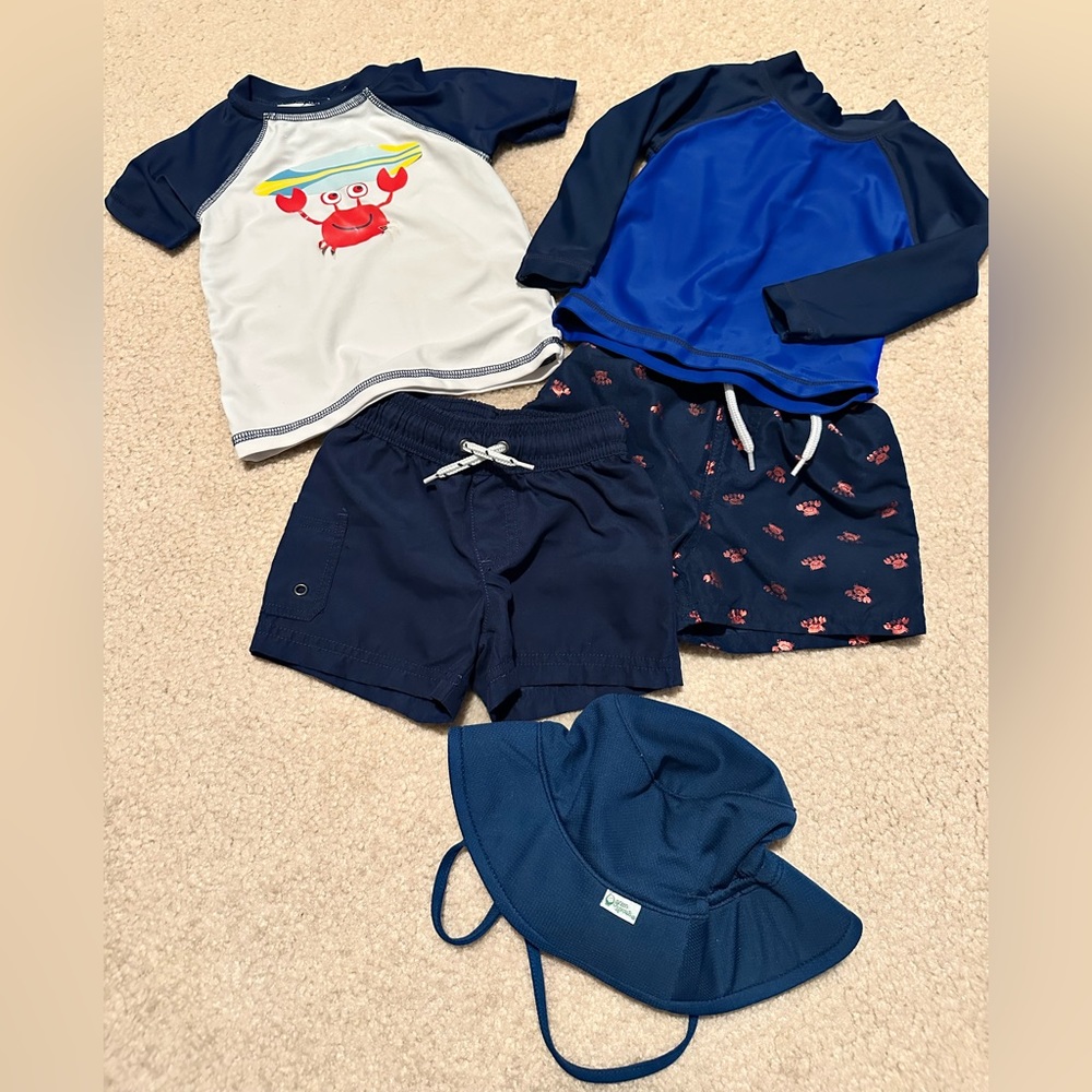 2 Sets swim trunks Carters and float mini. Size 9 months. Blue green sprouts hat